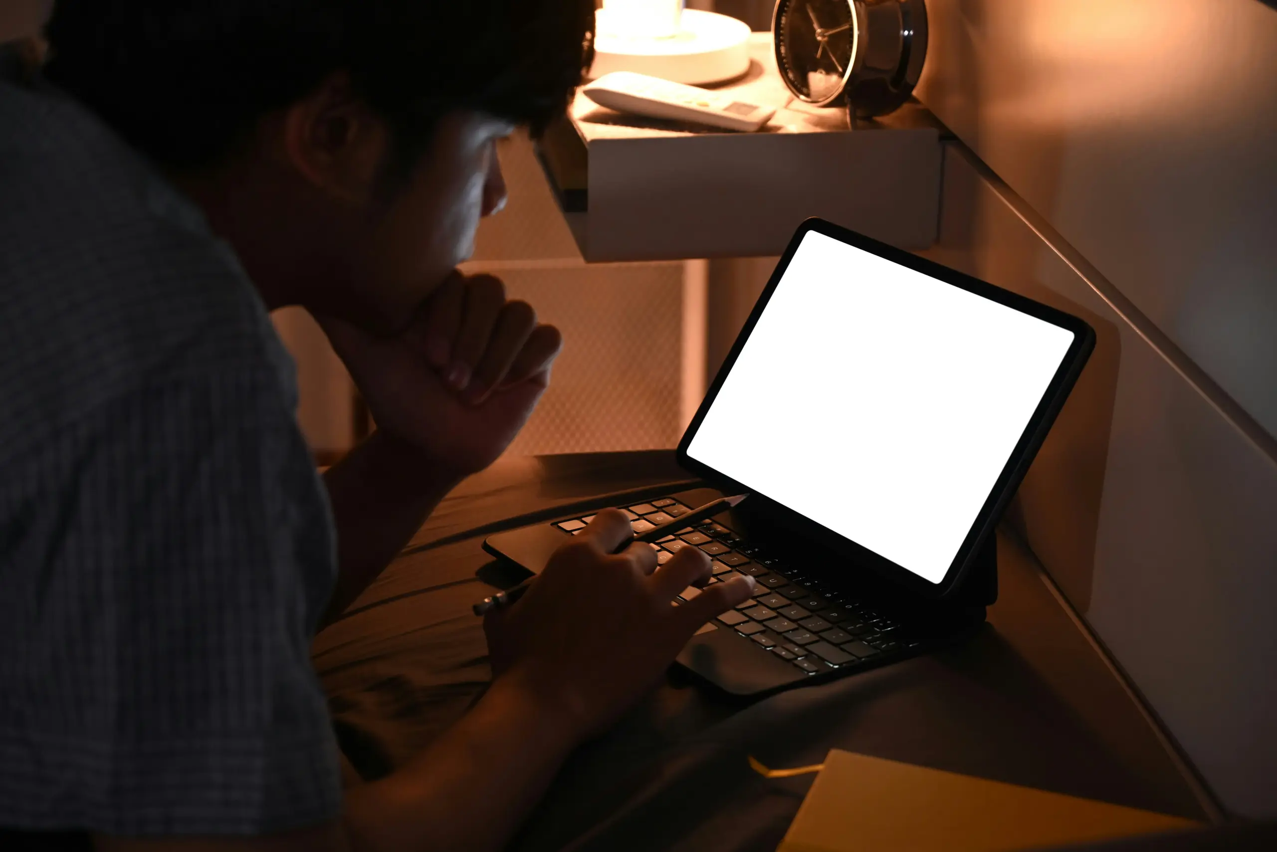 man looking at computer